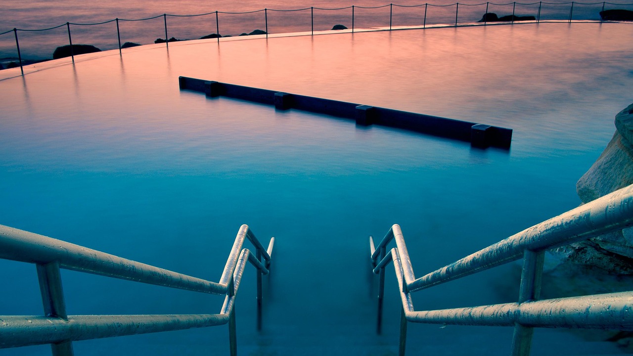 pool landscape services, evening light, infinity pool dubai villa